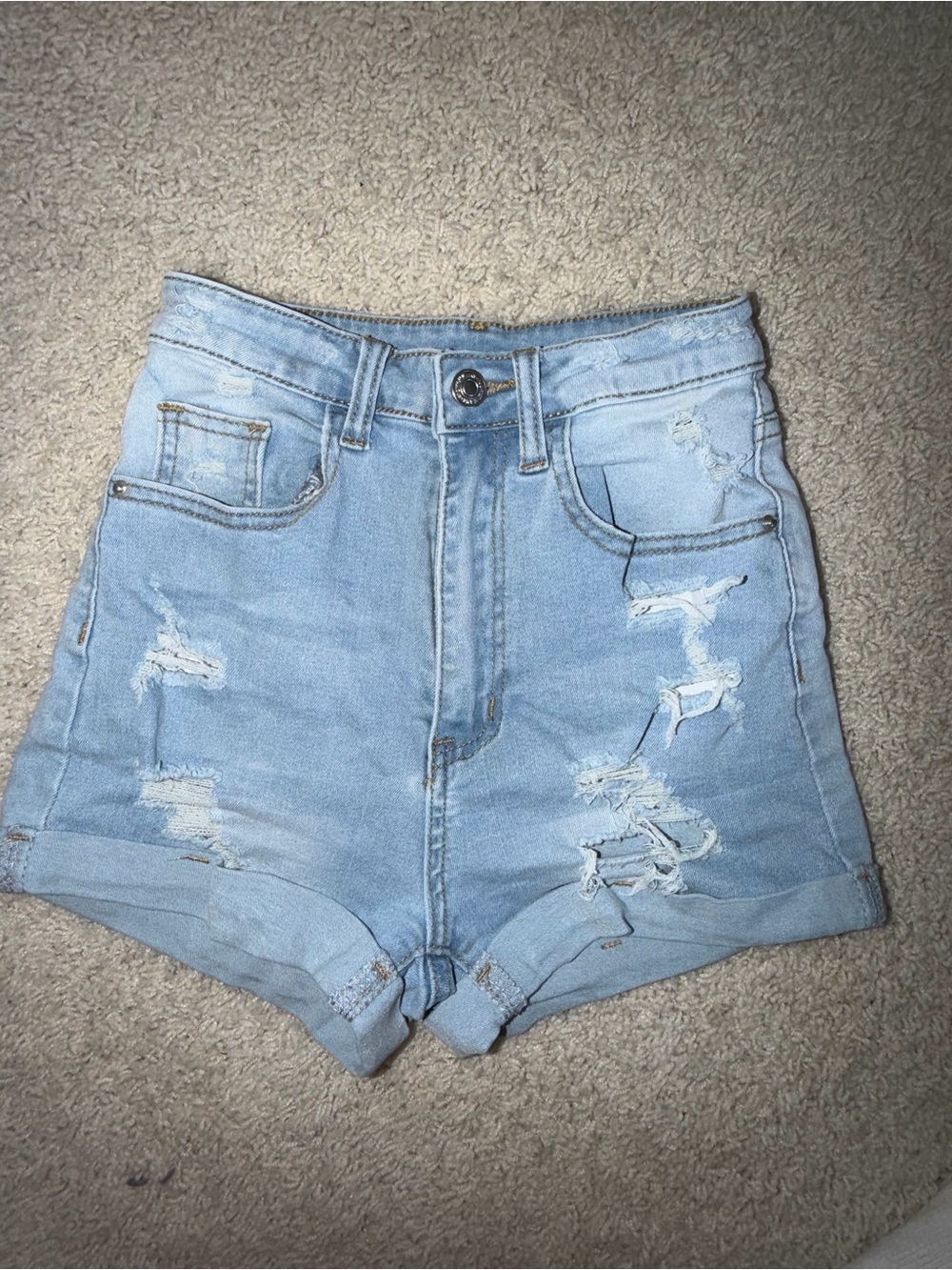 High-Rise Light Blue Distressed Denim Shorts